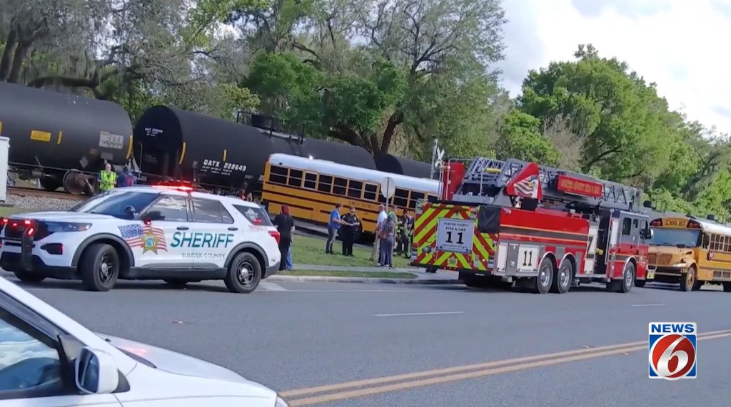 School bus driver busted after shocking video shows train clipping ...