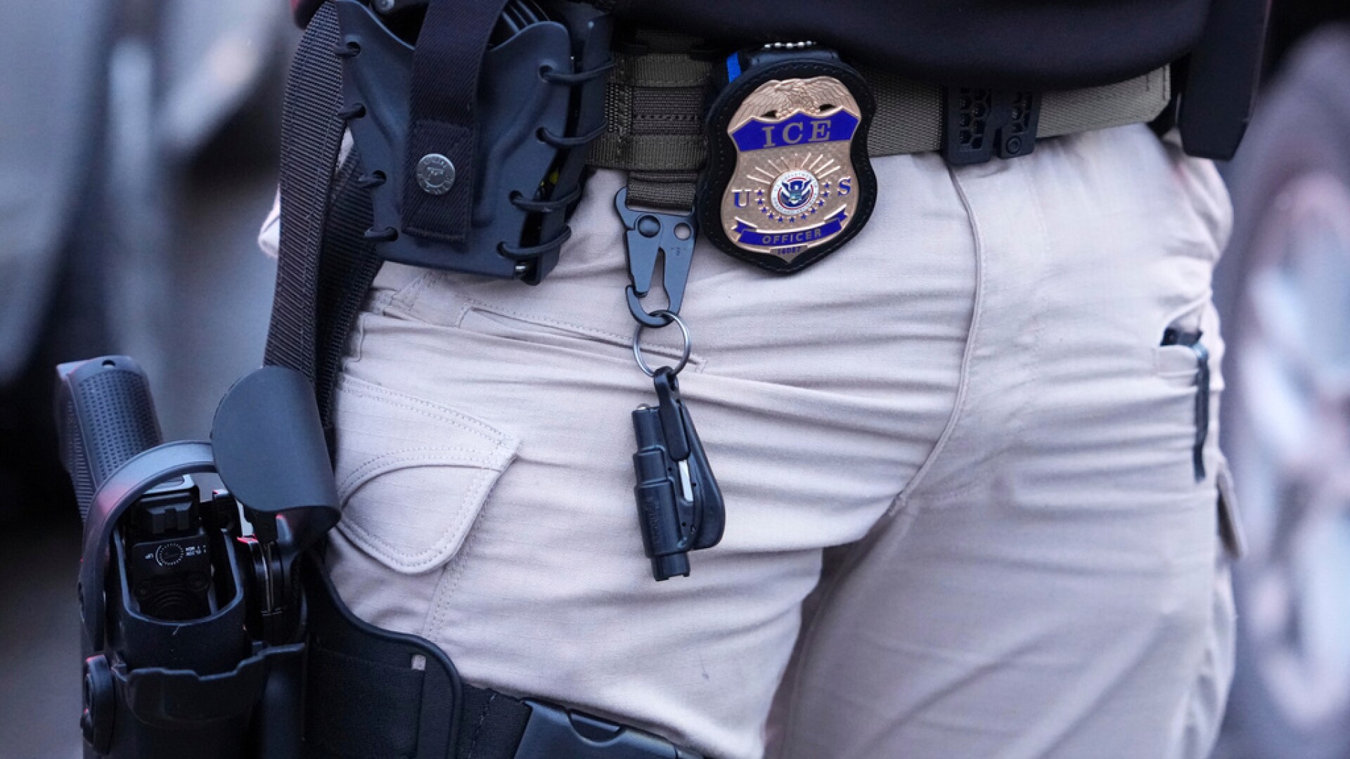 Warrant issued for ICE agent charged after allegedly pointing gun at ...