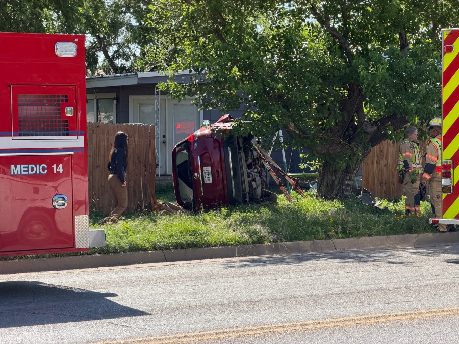 Nissan SUV rolls over onto fence in San Angelo - AOL