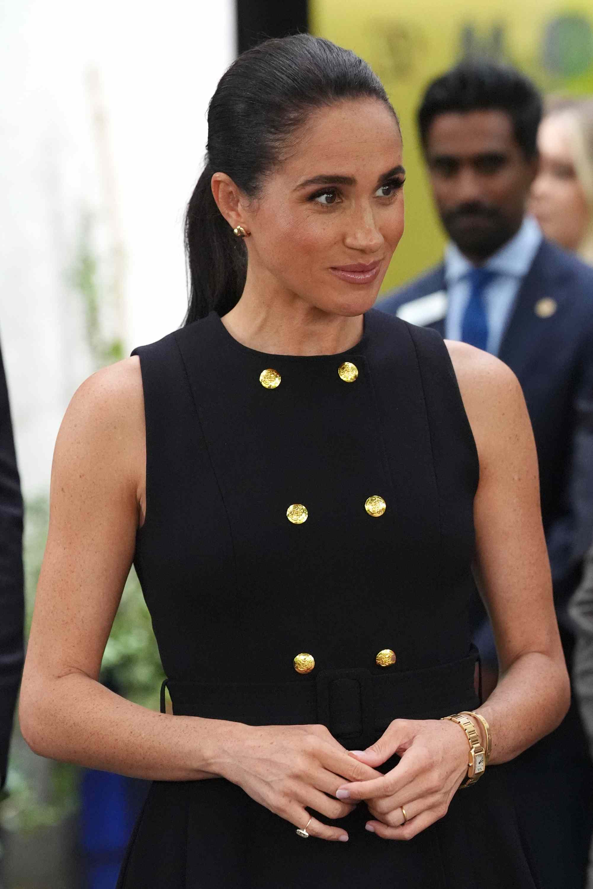markle gold dress Meghan Reveals the Unique Secondhand Piece That Made Its Way Into Her Australia Wardrobe luxury-fashion