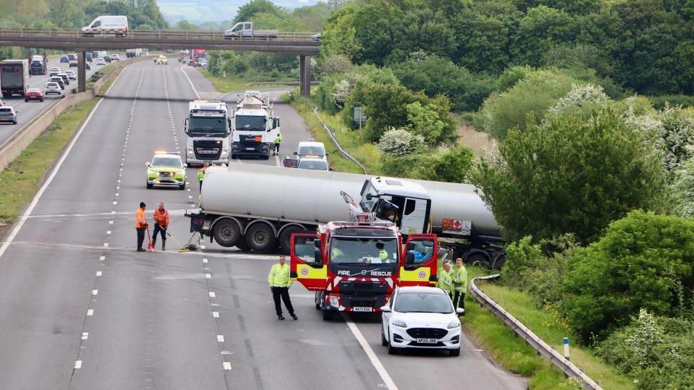 M5 reopens 14 hours after crash and fuel spill - AOL