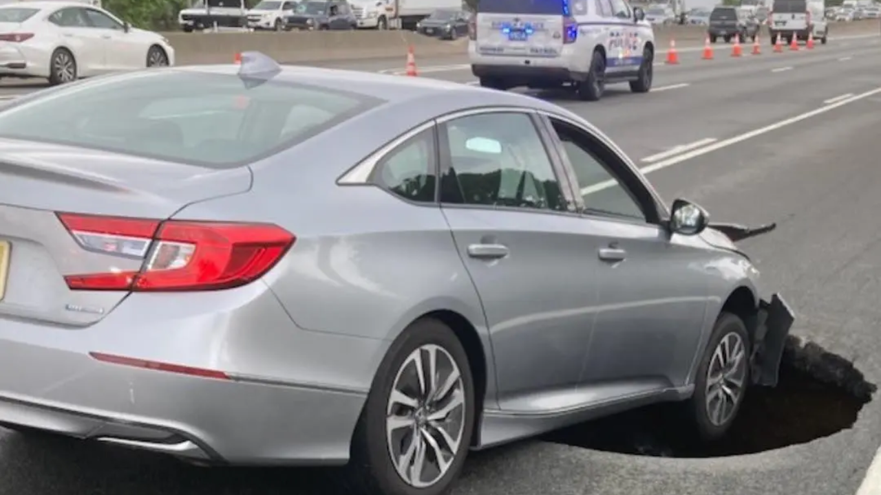Massive Sinkhole Nearly Swallows Car Whole on Long Island Expressway ...