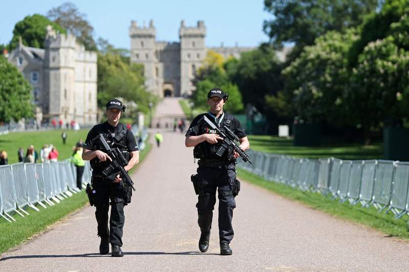 Armed police accused of SLEEPING instead of guarding King at Windsor