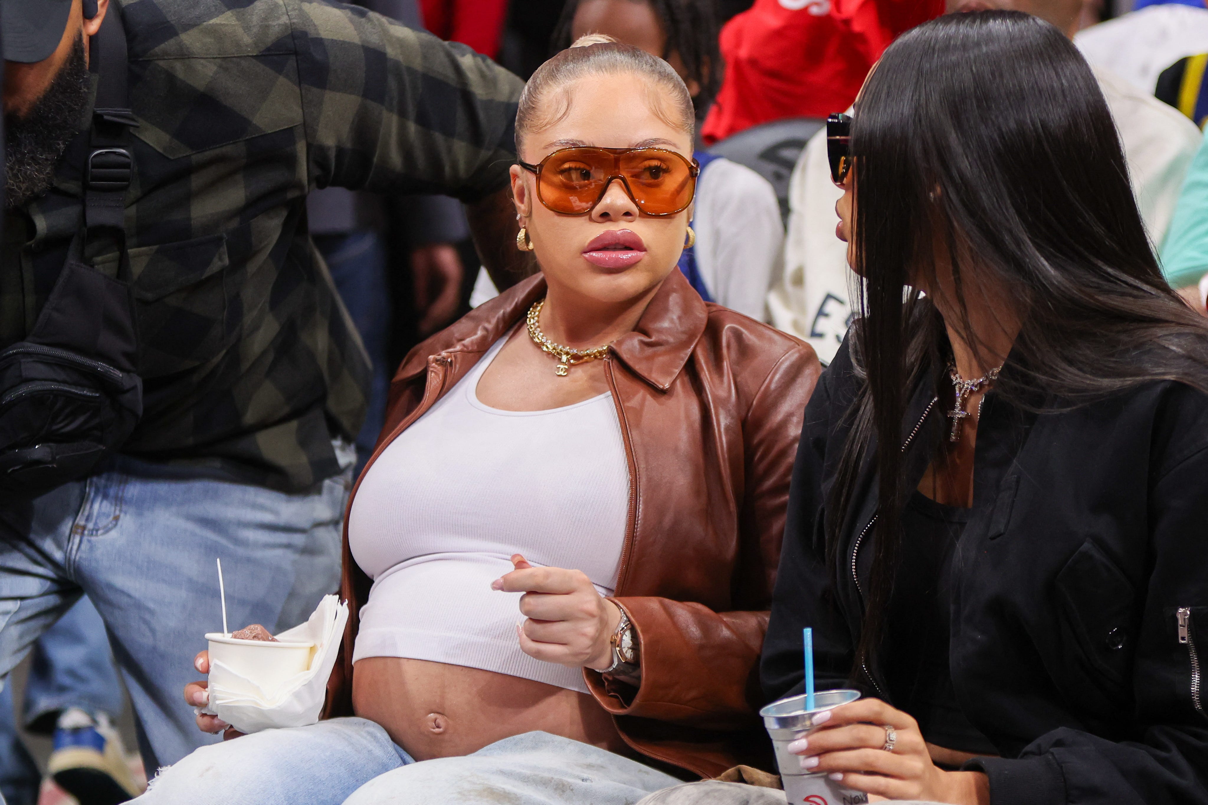 Latto gives rare glimpse of her pregnancy journey ahead of new album - AOL