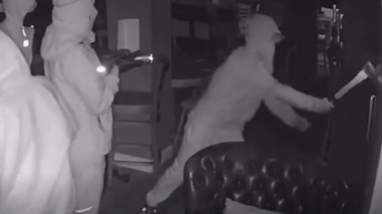 Video shows men armed with axe breaking into pub - AOL