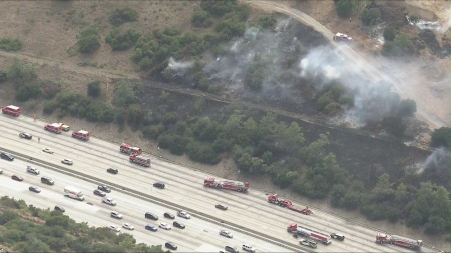 Crews battle brush fire near 405 Freeway in Sepulveda Pass - AOL