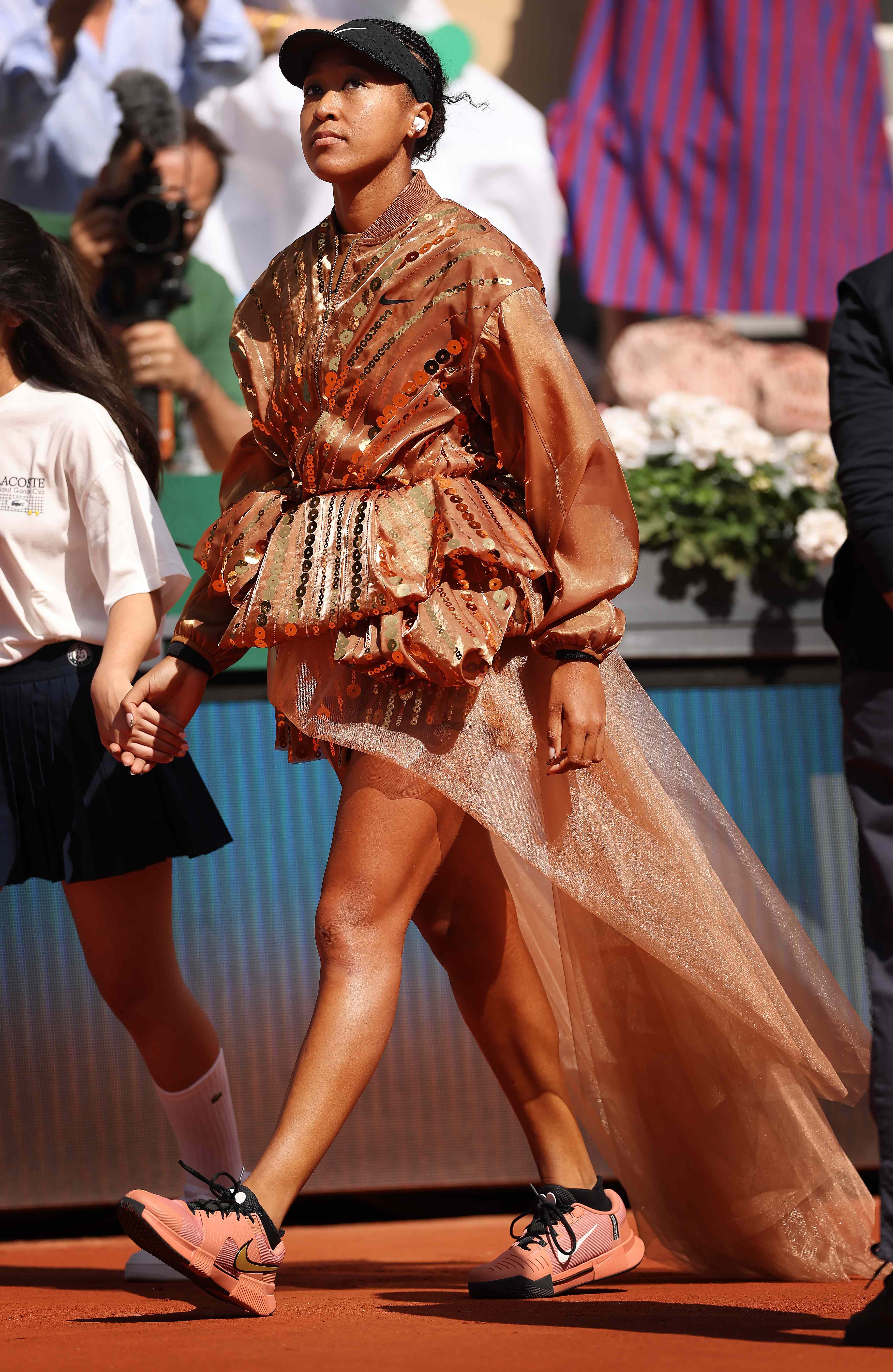 Naomi Osaka Dazzles in Bronze Peplum Dress With Tulle Train on the