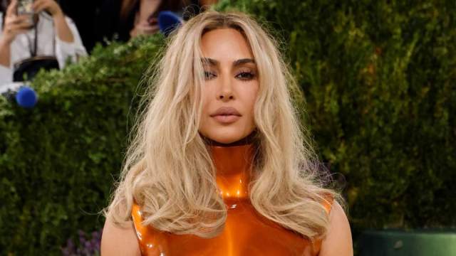kim kardashian orange dress Kim Kardashian West Stops Traffic in Orange Cut-Out Mini Dress