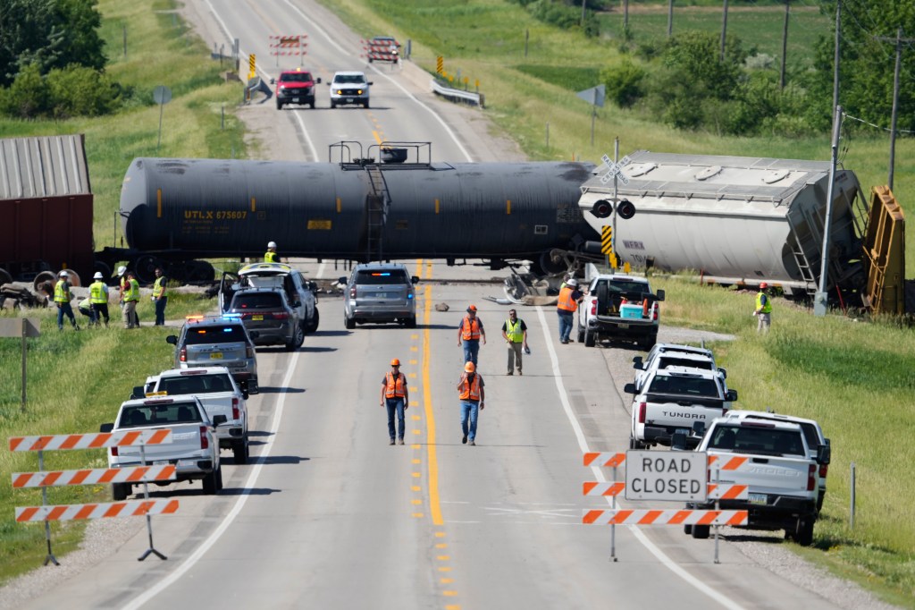 One dead in Iowa after train crashes into semi-truck - AOL