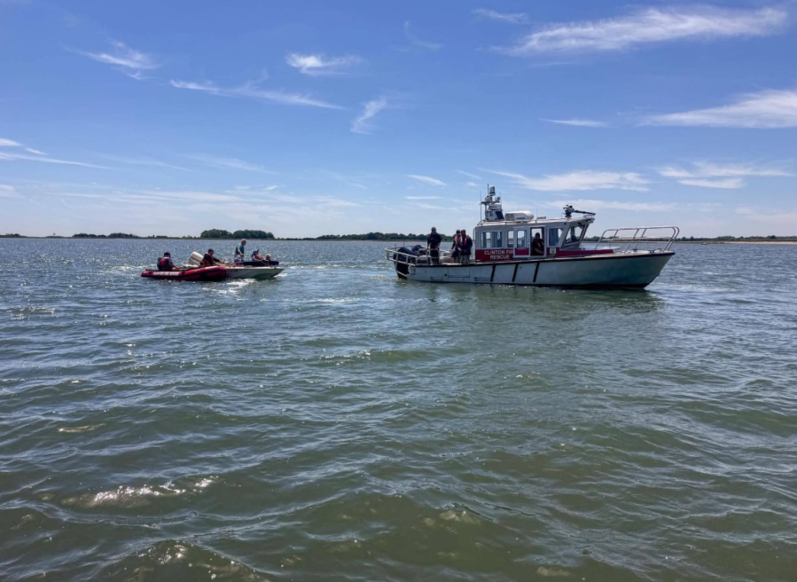 PHOTOS: Children, adults rescued after boat engine trouble in Clinton - AOL