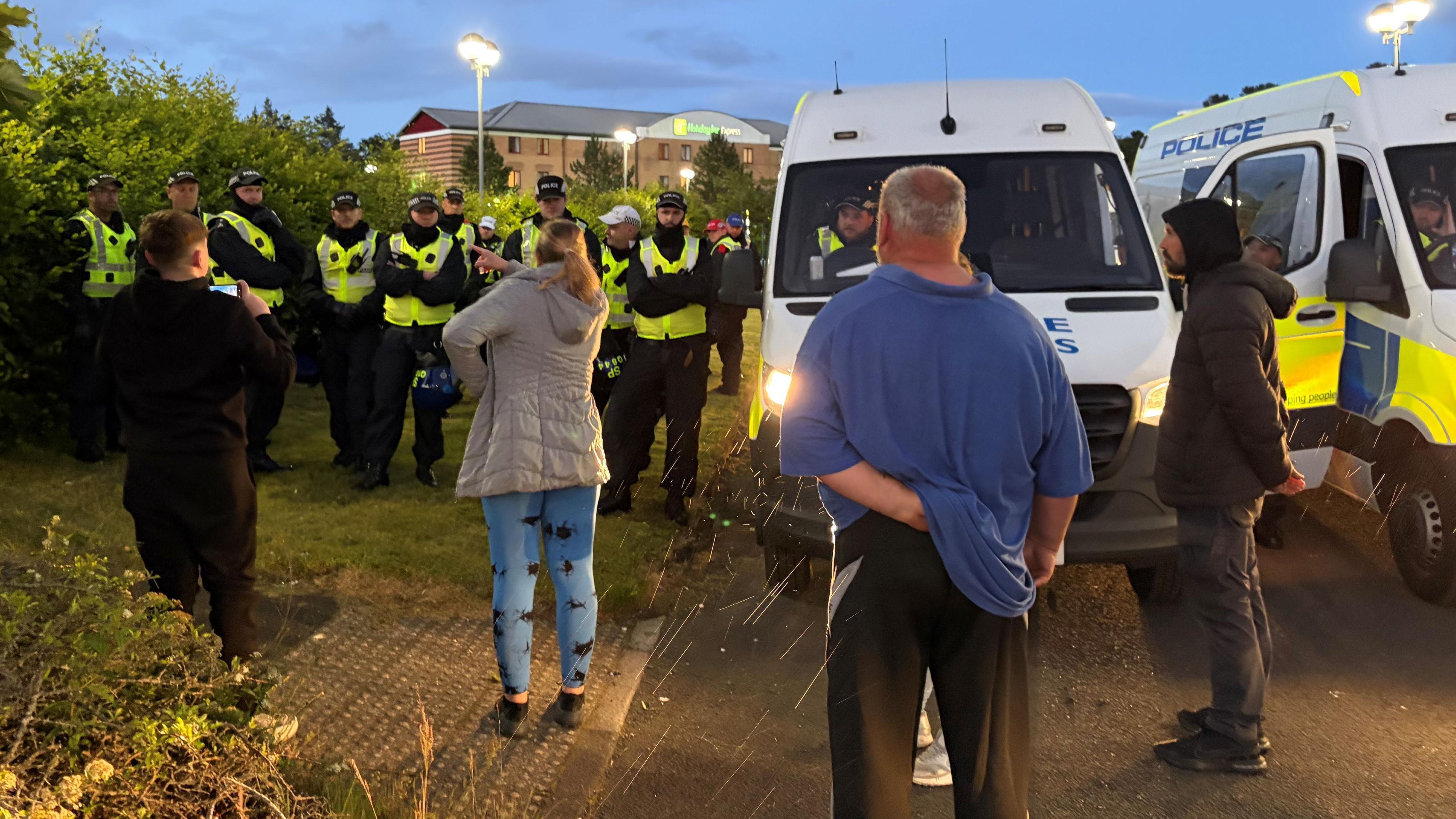 Woman charged with hate crime after protest at asylum hotel - AOL