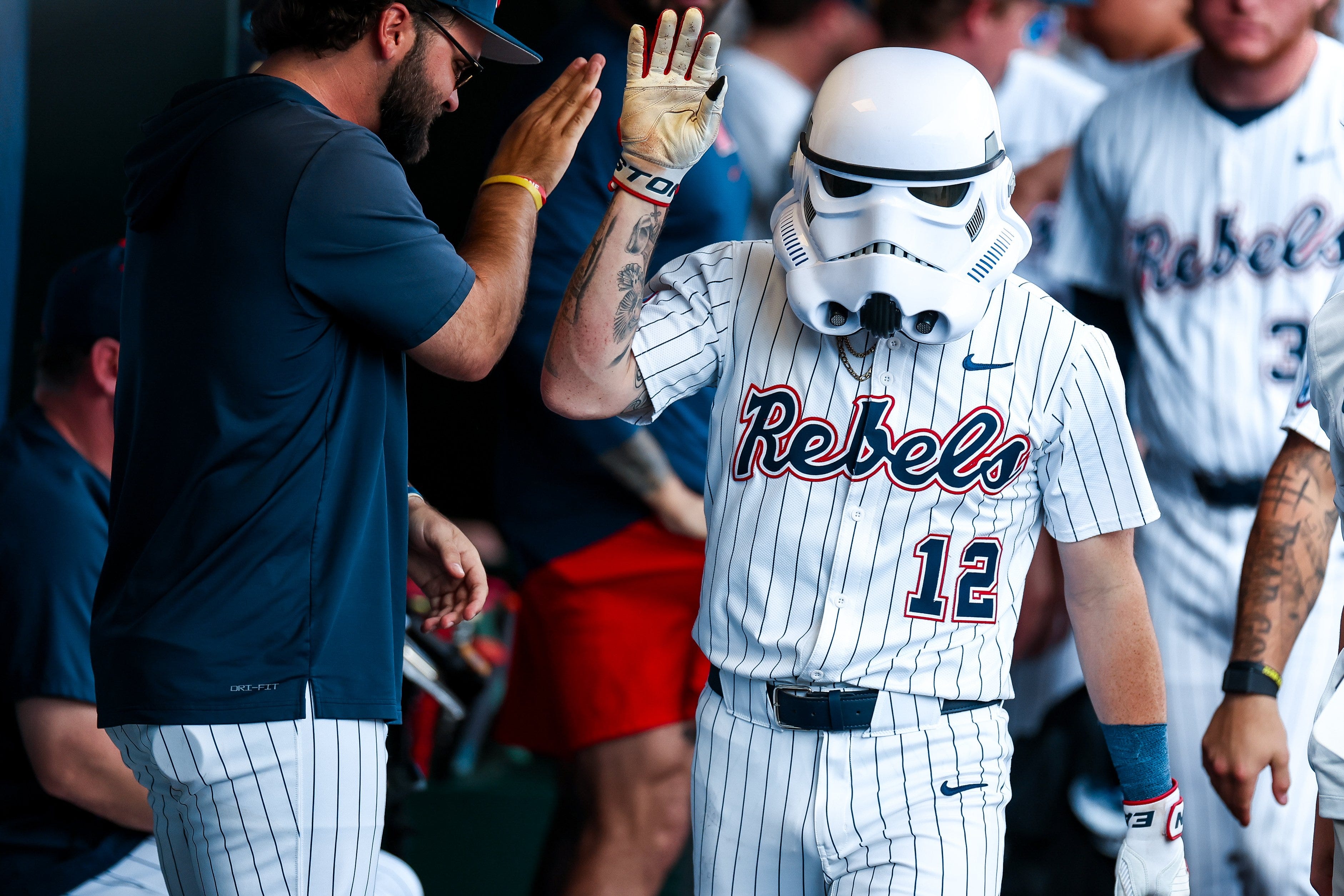 Why Ole Miss baseball players put on stormtrooper helmet after hitting ...