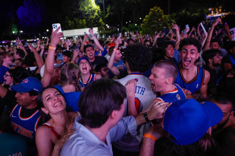 Knicks Rioting Riot police chase Knicks fans who smash up NYPD car as New York ...