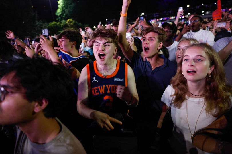 Knicks Rioting Riot police chase Knicks fans who smash up NYPD car as New York ...