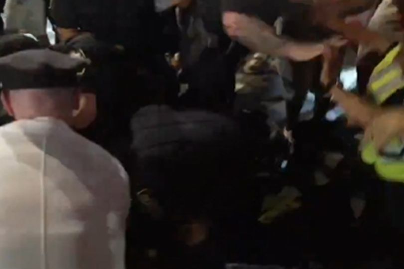 Knicks Rioting Riot police chase Knicks fans who smash up NYPD car as New York ...