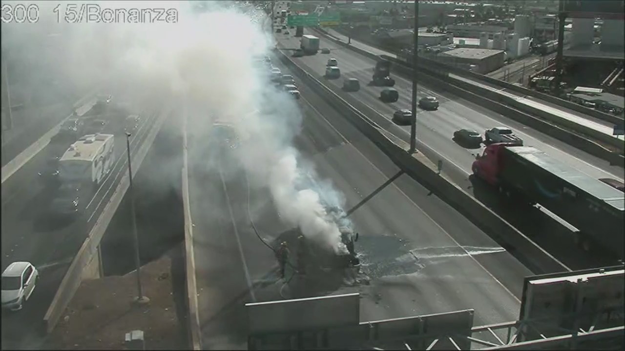 Vehicle fire blocks lanes on southbound I-15 near Spaghetti Bowl - AOL