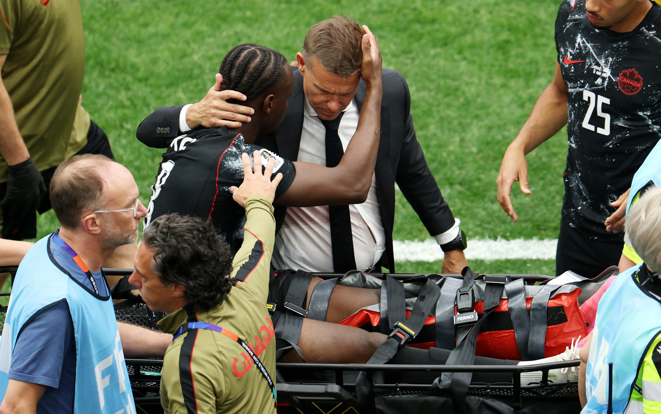 ‘His leg is hanging off’: Canada player suffers horror injury against ...
