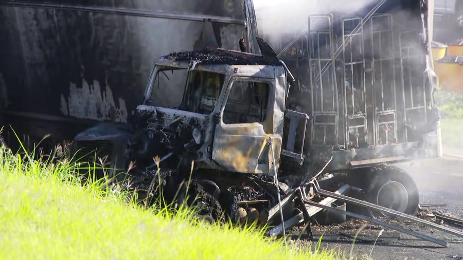 Two hurt after tractor, semi collide in fiery crash on I-35 - AOL
