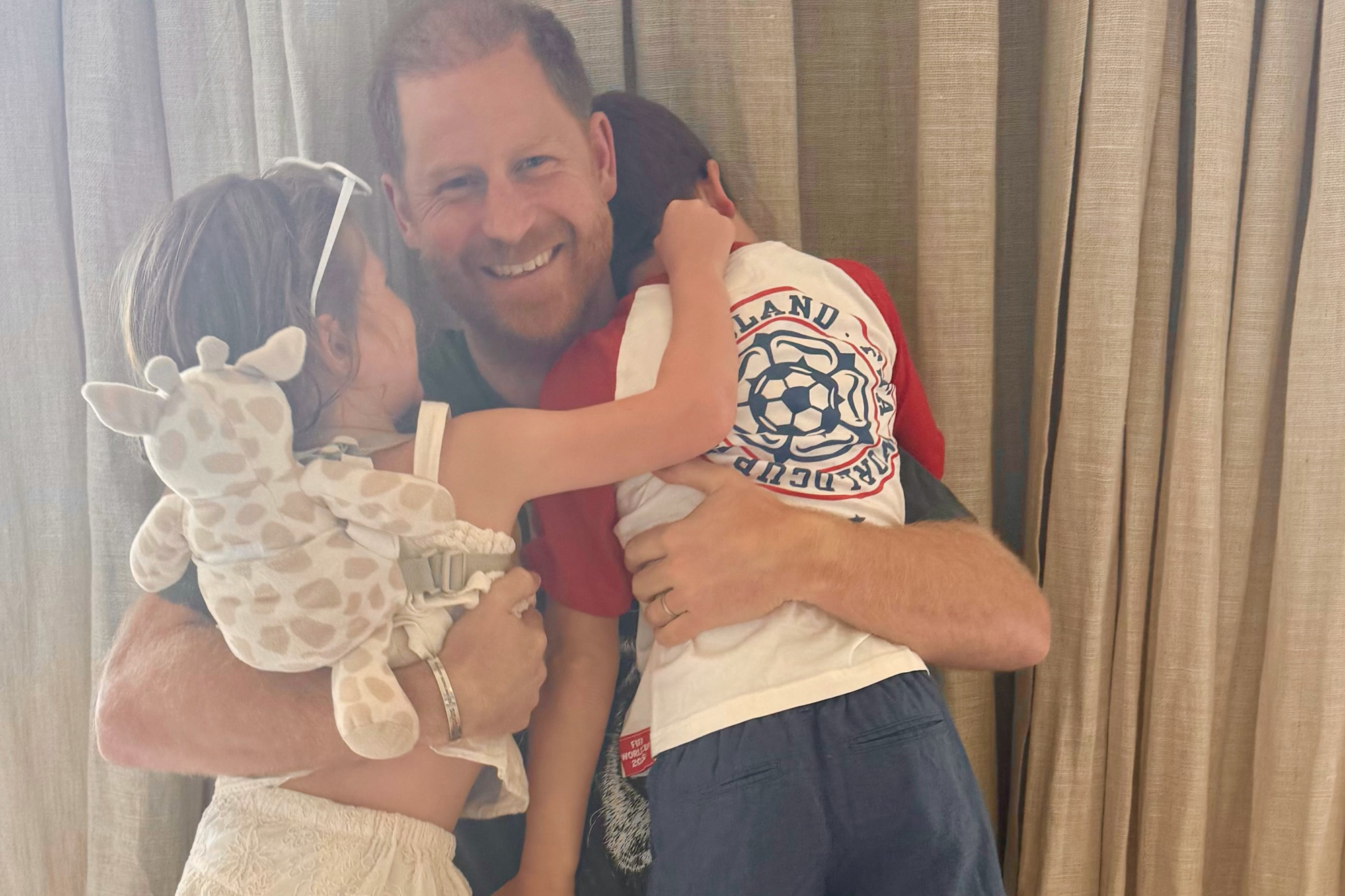 Prince Harry and Meghan Markle’s son, Archie, rocks England soccer ...