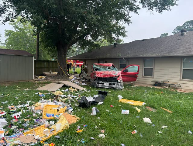 Driver hospitalized after vehicle crashes into structure in Longview - AOL