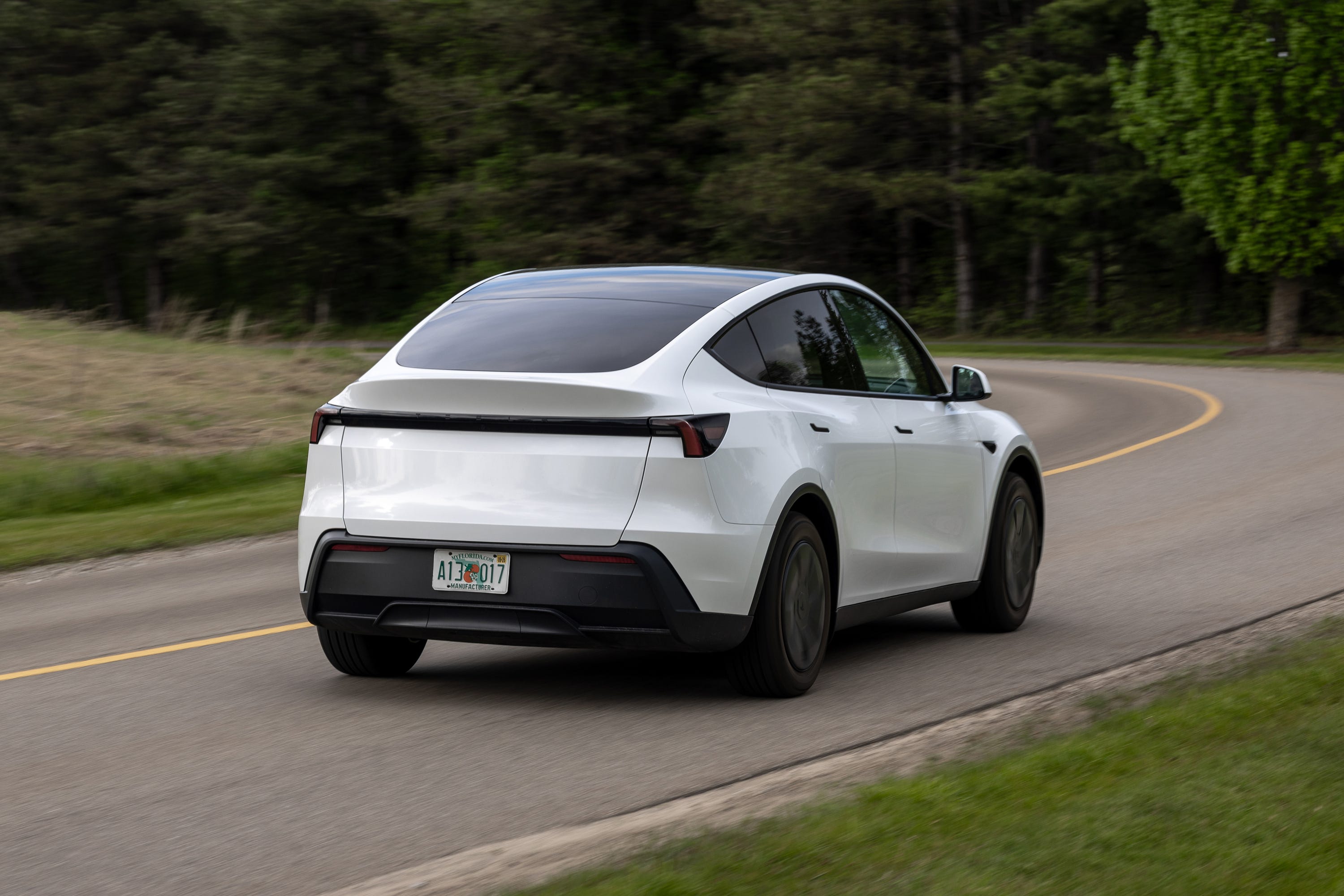2026 Tesla Model Y vs. 2026 Toyota bZ Comparison Test: Which ...