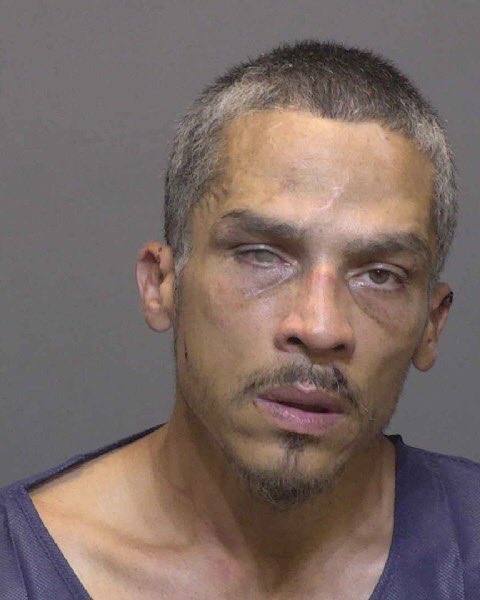 Man charged after allegedly slashing man in the face during robbery in ...