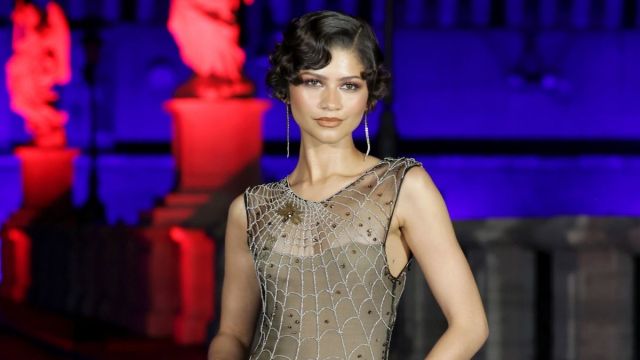 zendaya casual dresses Zendaya Wore a Plunging Minidress With Tennis Ball Stilettos