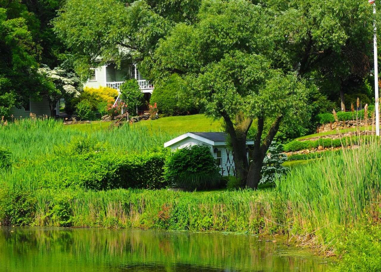A home near a pond in Great Neck, New York. -