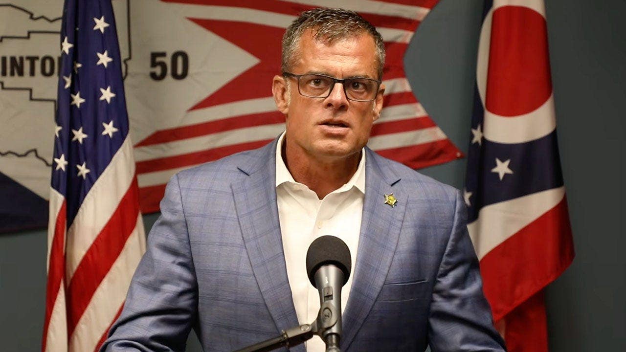 Andy Wilson at a press conference
