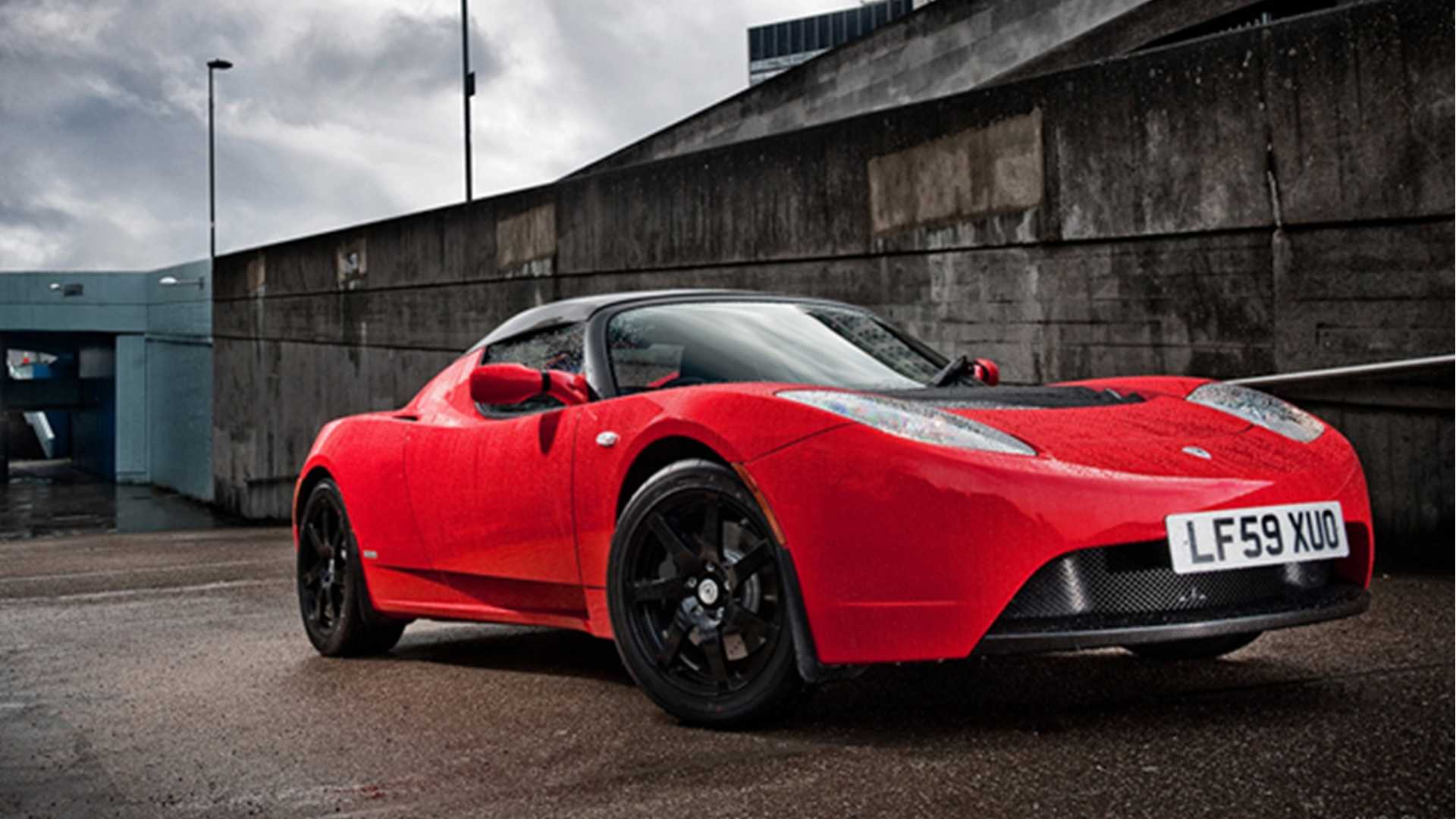Red 2010 Tesla Roadster