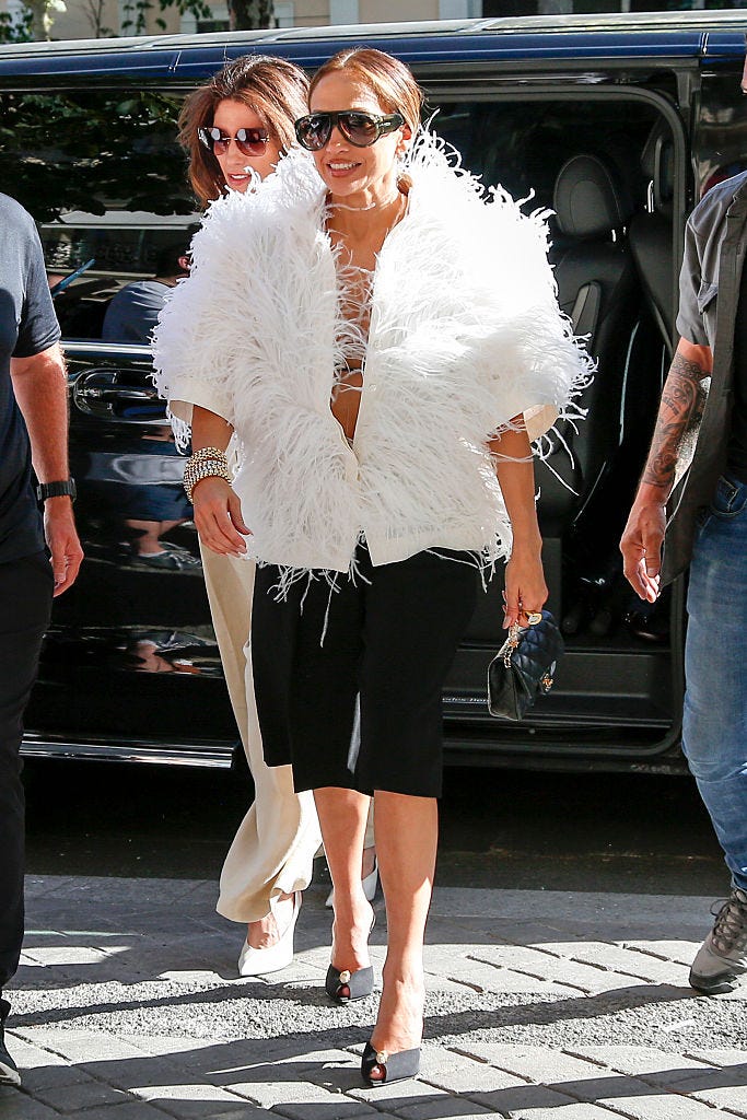 jlo white mini dress Jennifer Lopez wows in lace bridal dress for a very special occasion