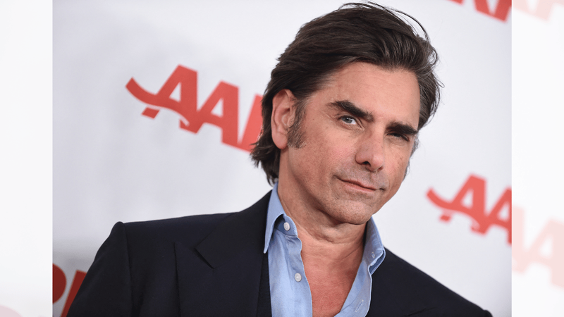 As acusações de John Stamos sobre sua ex-mulher deram início à rivalidade. MEGA