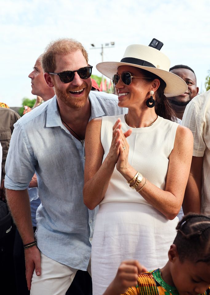 meghan markle espresso silk dress Meghan Markle's Ralph Lauren Gown Wows At A Benefit Gala