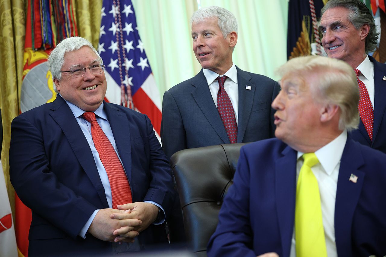 President Donald Trump talks to West Virginia Gov. Patrick Morrisey during an Oval Office event on June 4.Credit: Kevin Dietsch/Getty