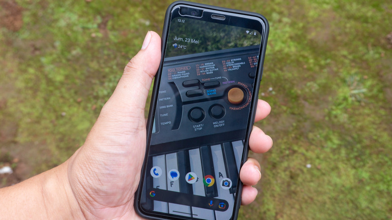 The Pixel 4 phone in hand.
