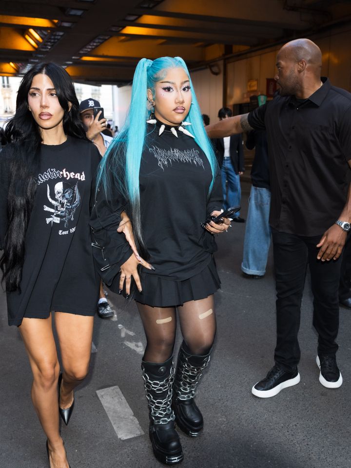 North West’s bold blue-hair style at a public appearance North West with electric blue hair and an alternative black outfit at a public appearance