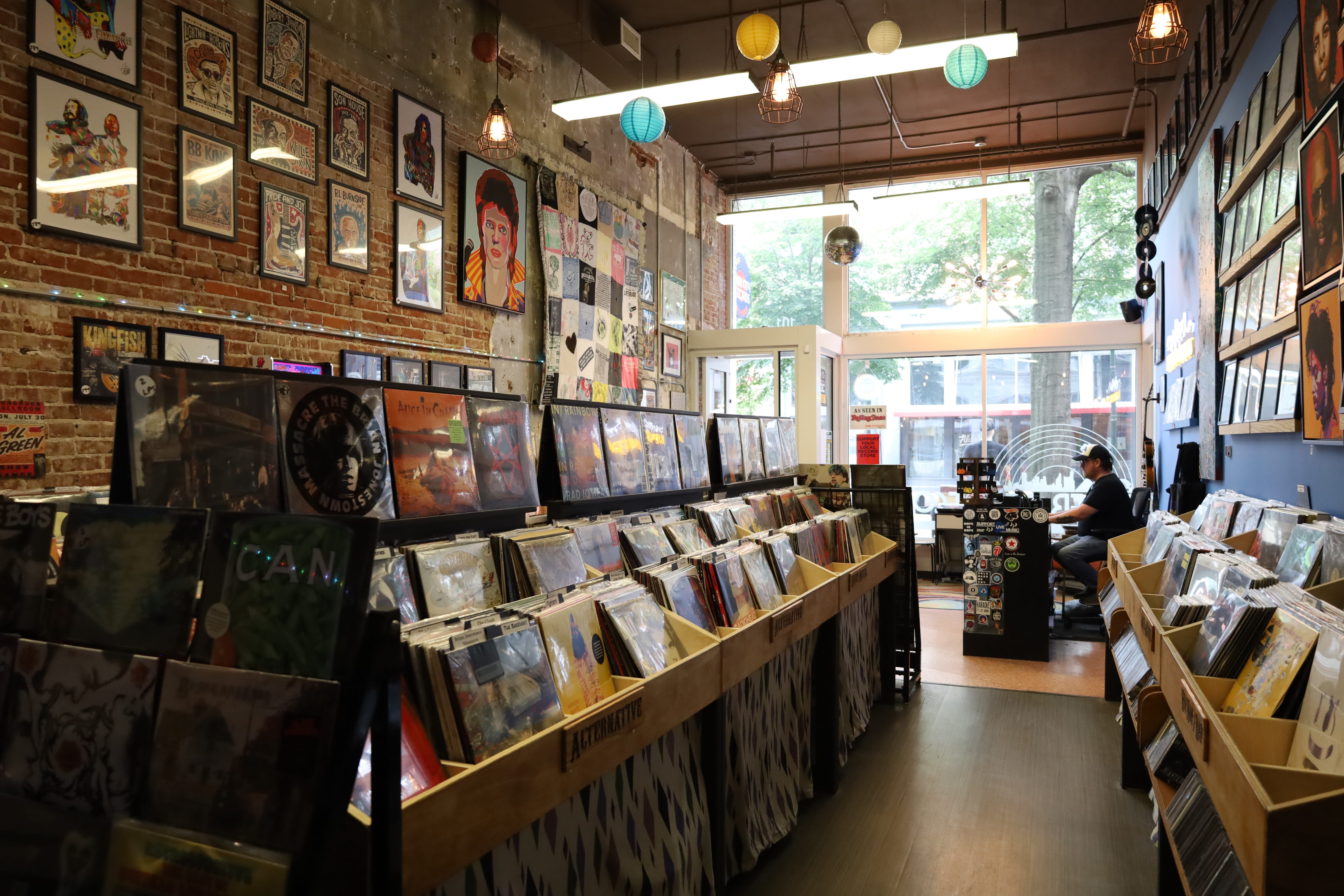 Chris Braswell mans the counter at his Downtown Memphis business River City Records at 101 S Main St., May 26, 2026.