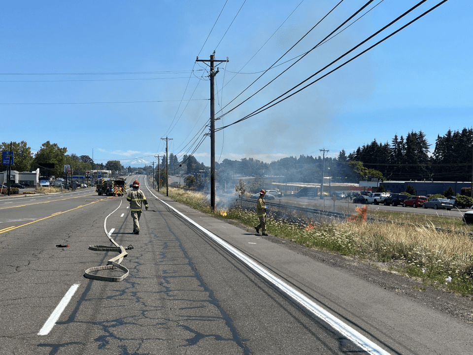 Grass fire under control after downed power lines shut down TV Hwy west ...