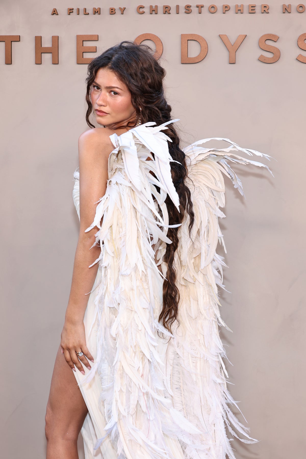 zendaya dress looking ethereal as she wears angel wings for the NY premiere of #TheOdyssey Full gallery here: https://deadline.com/gallery/the-odyssey-red-carpet-photos-zendaya-greek- dress/ (Photos: Getty) Zendaya's Barely-Held Dress Has Cutouts