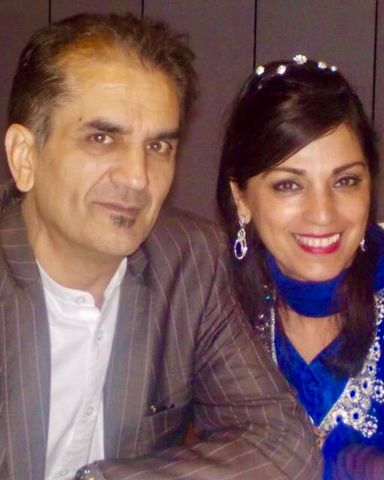 Parveen Ashraf with her husband Qamar AshrafCredit: Facebook
