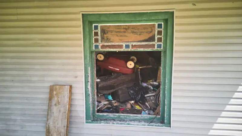 Windows were blocked by piles of clutter, limiting visibility into several rooms of the residence.CrimeTimeLines