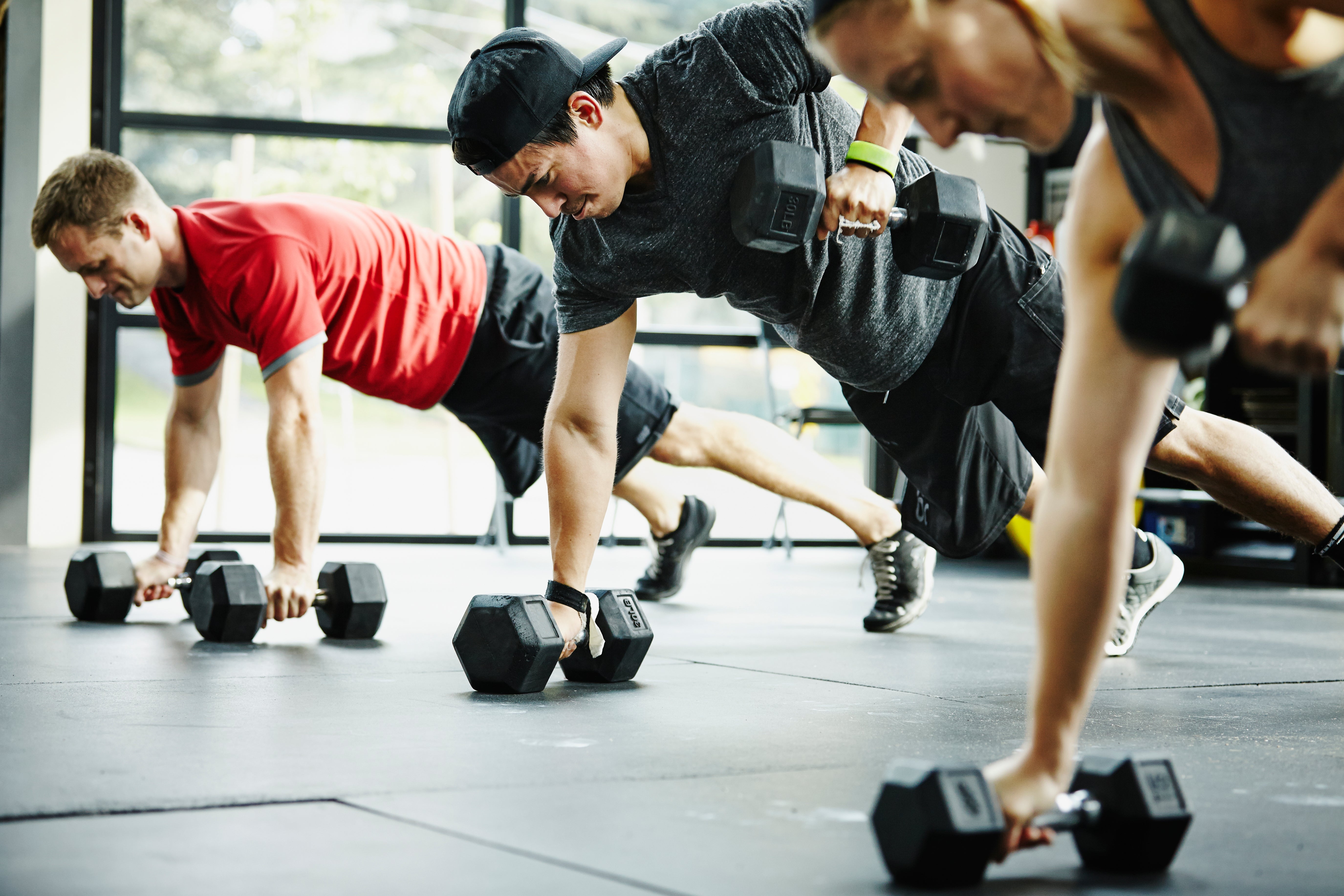 A group of people working out with weights