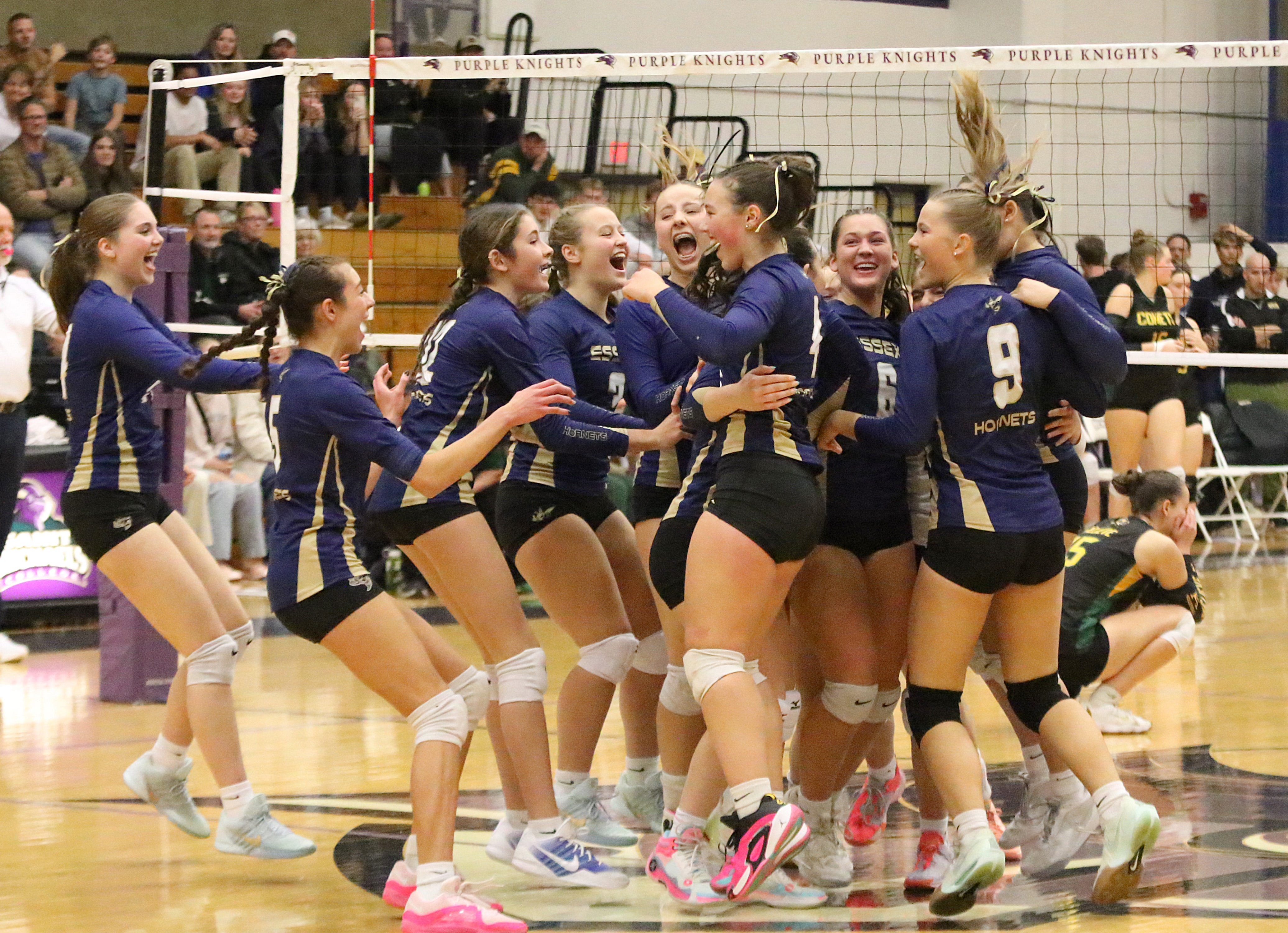 The Hornets celebrate after the final point in Essex's 3-0 win over BFA in the 2025 D1 championship game at St. Michael's College.