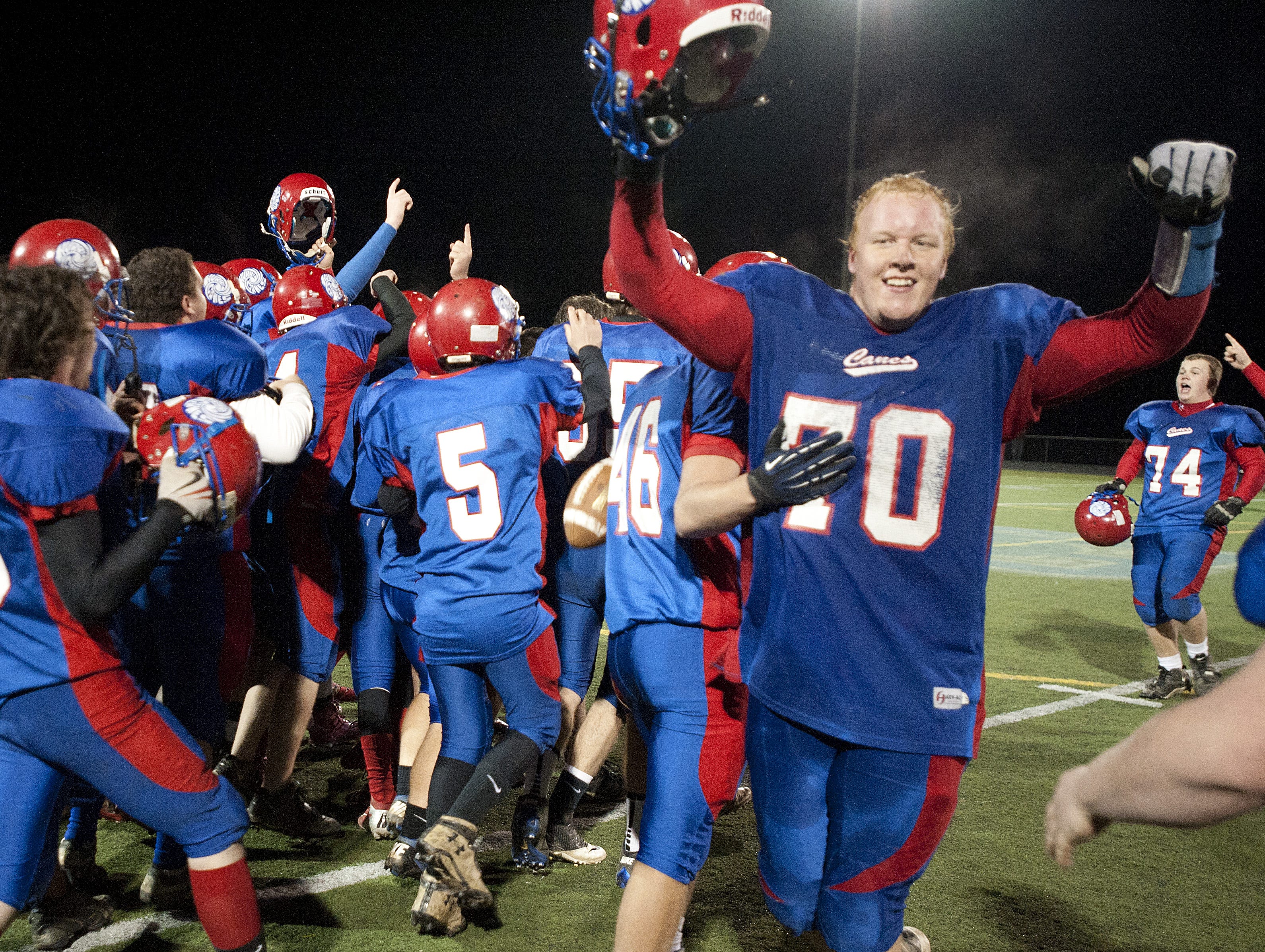 Hartford celebrates its 35-27 win over BFA St. Albans at the Division I high school football championship game at South Burlington High School on Saturday Nov. 10, 2012.