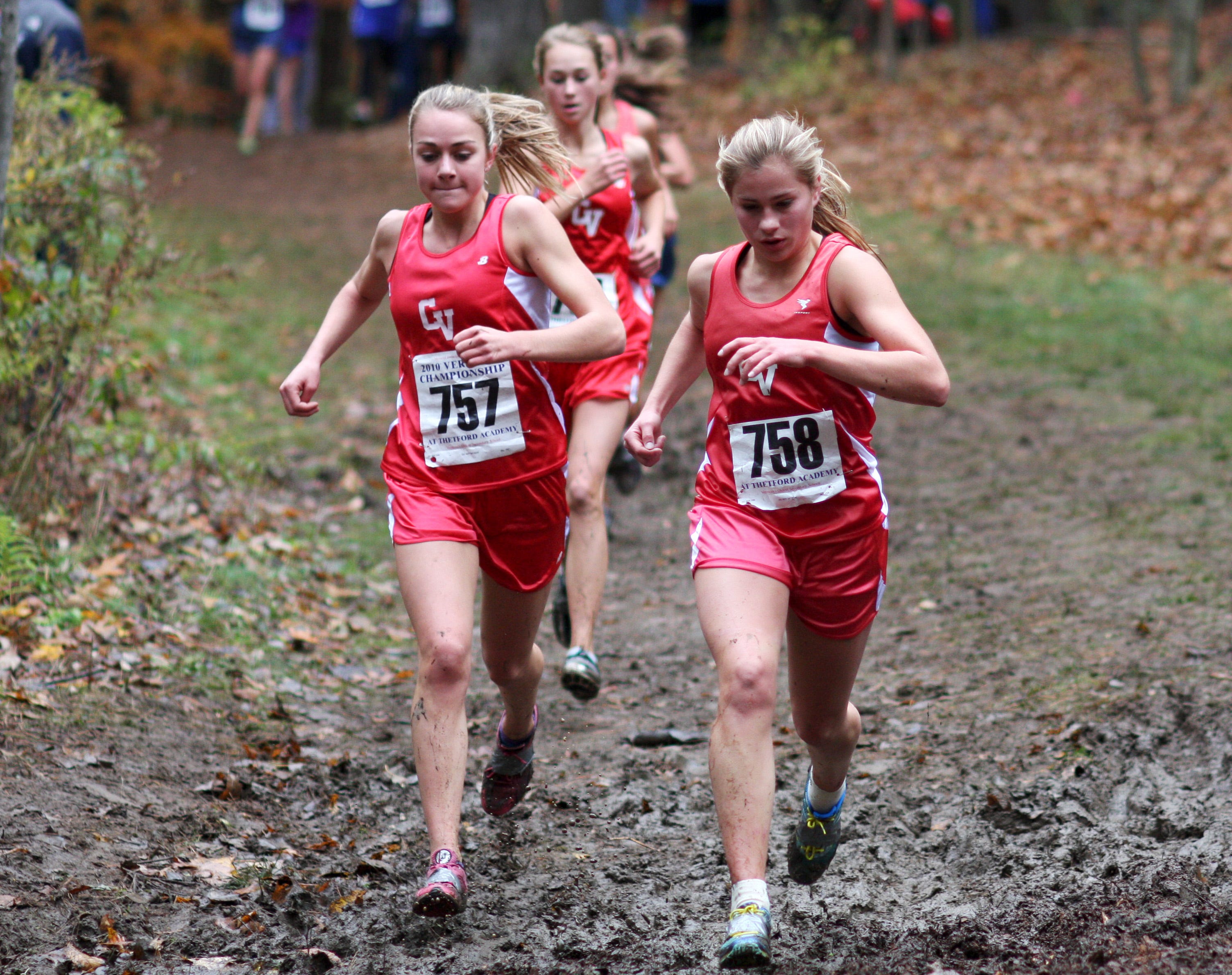 Champlain Valley's Summer Spillane (#757) and Taylor Spillane (#758) run in the Division girls I race during the Vermont high school cross-country championships at Thetford Academy on Saturday, October 30, 2010.