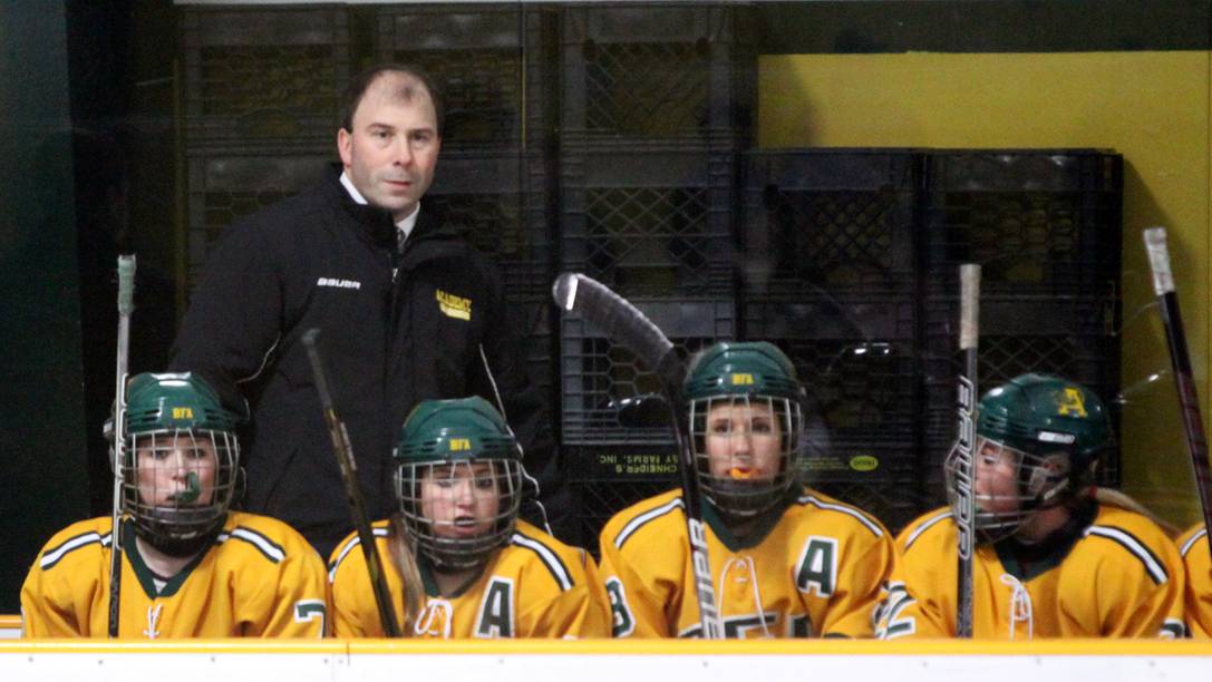 Longtime BFA-St. Albans head coach Luke Cioffi watches a game during the 2012-13 Vermont high school girls hockey season.