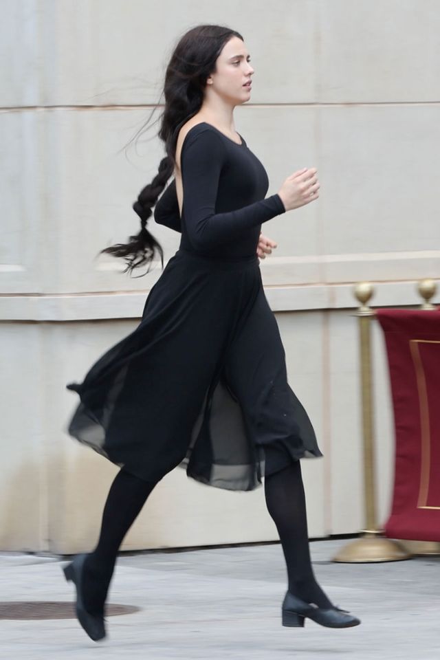 margaret qualley little black dress Stuns in a Micro Minidress With a Low Neckline line design with scalloped neck for an elegant Staud black dress for spring