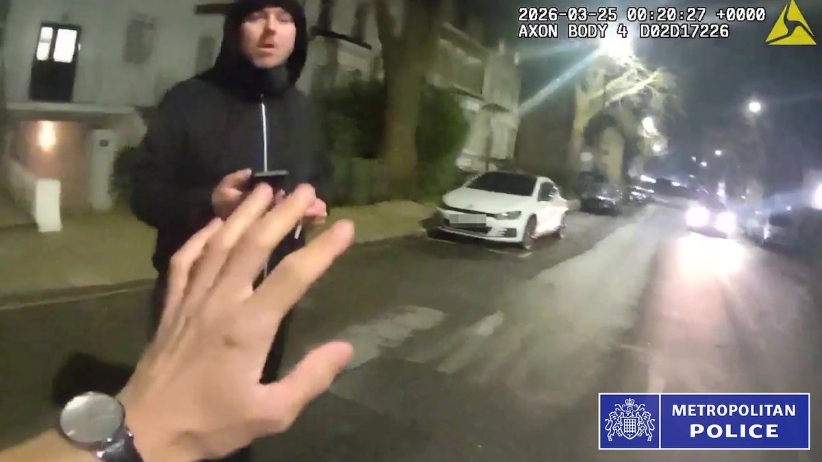 Body-worn footage shows a plain clothes officer approaching Durkan as he appeared to be loitering outside a house while holding a mobile phone (Metropolitan Police)