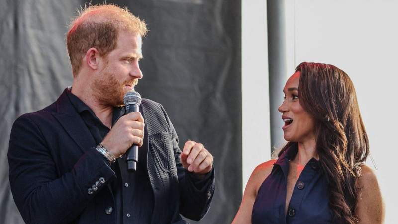 The royal appeared 'restrained' at the event without Markle.MEGA