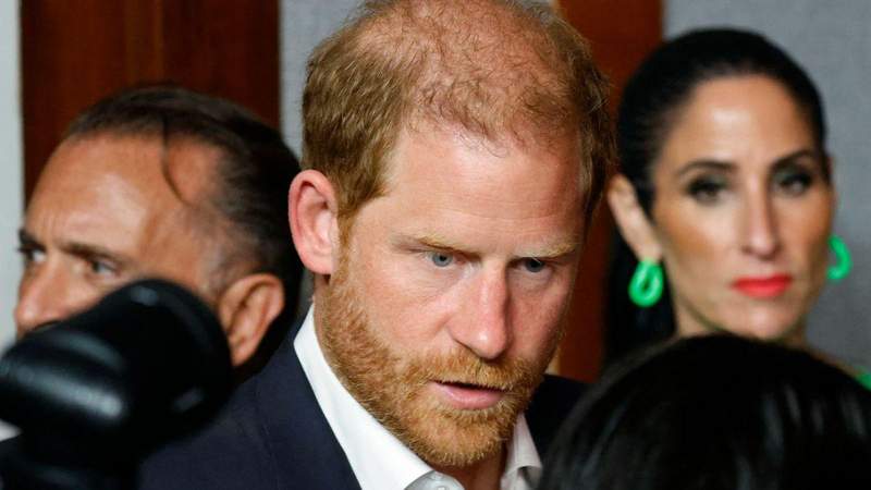 'That normally shows a lack of confidence,' a body language expert said of Prince Harry's behavior.MEGA
